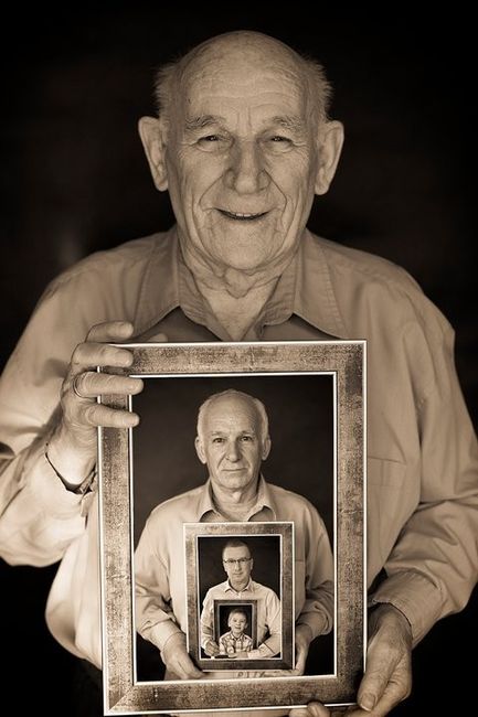 A man with pictures of several generations is one of many very creative family tree ideas