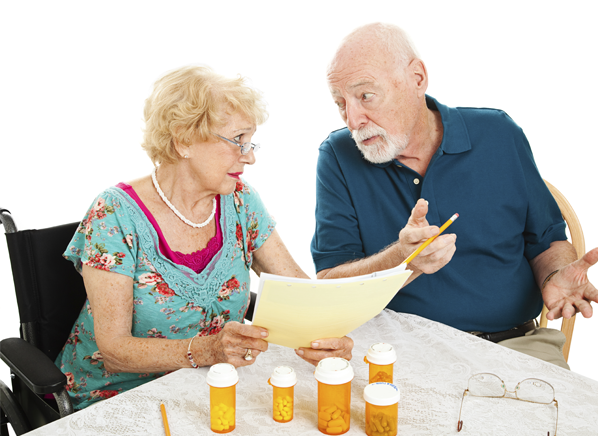 A man & woman discussing the possible side effects of Namenda in elderly people