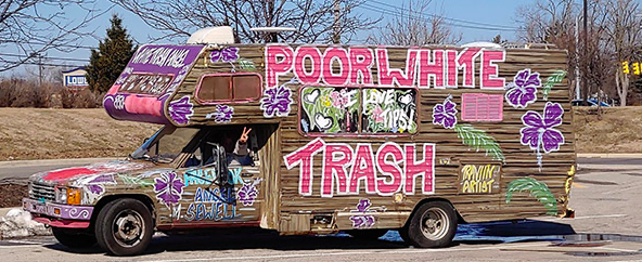 RV painted with 'Poor White Trash'. A big reason to learn about online grocery shopping for the elderly