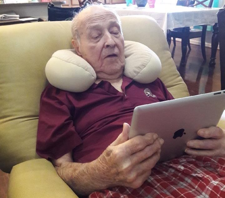 An elderly gentlemen learning how to prepare for a telehealth appointment