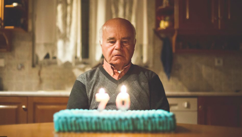 The effects of loneliness in the elderly can be devastating. Here an old man is not happy celebrating his birthday