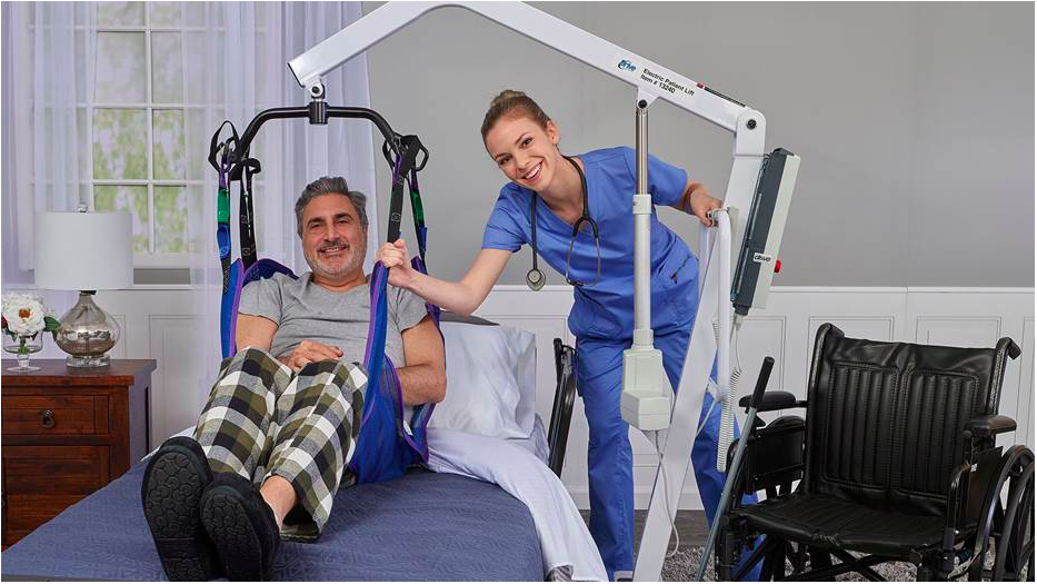 Picture of a nurse using a Hoyer lift with a patient